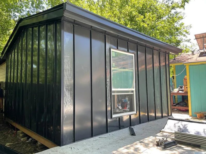 Black standing seam metal wall panels for Roof Inspection in Santa Ana